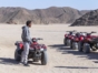 Driving ATV QUAD SAFARI through the Atacama Desert, Antofagasta region, Chile