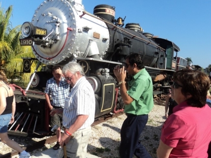 Go through the sugar cane plantations in a train drawn by an old steam locomotive, Morón