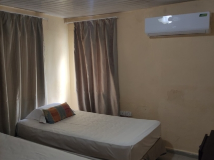 BEACH HOUSE (2 bedroom's with private bathrooms)